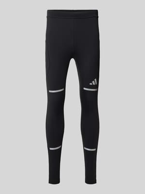 Slim Fit Trainingshose mit reflektierenden Details Modell 'adi' Shop The Look MANNEQUINE