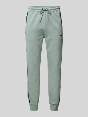 Slim fit sweatpants met structuurmotief, model 'Hover' Shop The Look MANNEQUINE