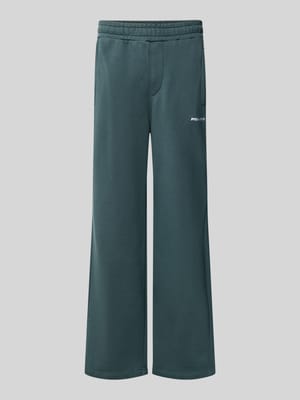 Spodnie dresowe o kroju luźnym z mieszanki bawełny z detalem z logo Shop The Look MANNEQUINE