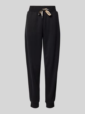 Relaxed Fit Sweatpants mit Tunnelzug Modell 'STRIPE' Shop The Look MANNEQUINE