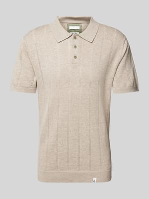 Slim fit poloshirt met labeldetail Shop The Look MANNEQUINE