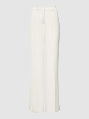 Spodnie o kroju wide leg fit z zakładkami w pasie i wpuszczanymi kieszeniami w stylu francuskim Shop The Look MANNEQUINE
