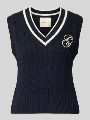 Bezrękawnik z dekoltem w serek i wyhaftowanym logo Shop The Look MANNEQUINE