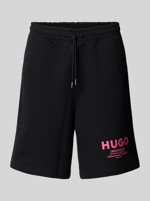 Baggy Fit Sweatshorts mit Label-Print Modell 'Nomario' Shop The Look MANNEQUINE