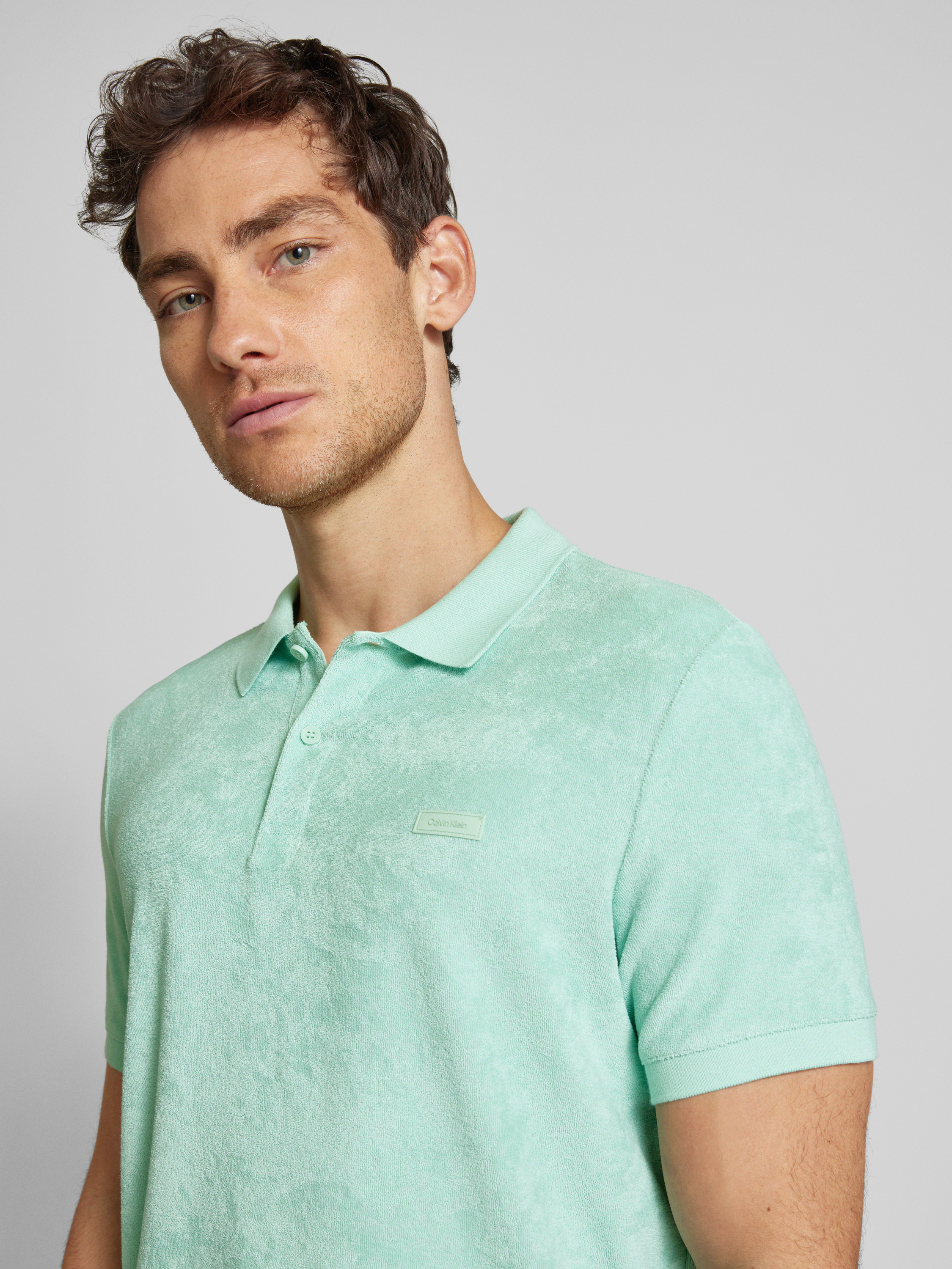 CK Calvin Klein Poloshirt mit Label-Detail (helltuerkis