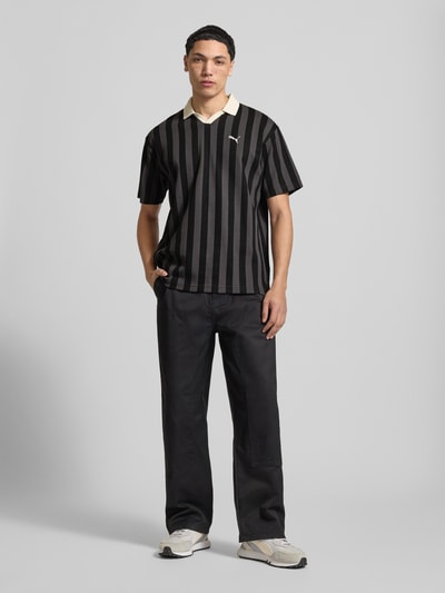 PUMA Performance Relaxed Fit Poloshirt mit Label-Stitching Modell 'CLASS' Black 1