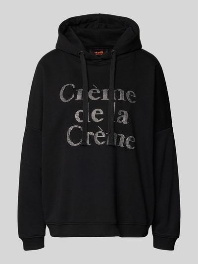 Produktfoto, Oversized Hoodie mit Kapuze von miss goodlife in Schwarz, reine Baumwolle, Kapuze mit Tunnelzug, gerippte Abschlüsse, Label-Detail.