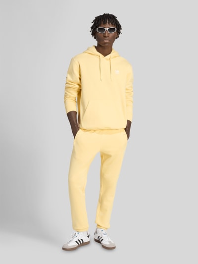 adidas Originals Trainingshose aus reiner Baumwolle Hellgelb 1