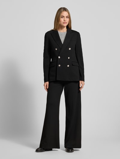 Vrouwenmodel draagt Polo Ralph Lauren Zweireihiger Blazer mit Knopfverschluss, zwart, regular fit, reverskraag, voorkant, full-body.