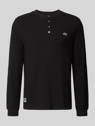 Produktfoto, Regular Fit Langarmshirt aus reiner Baumwolle von Lacoste in Schwarz mit Knopfleiste und Logo, Herren Langarmshirt von Lacoste