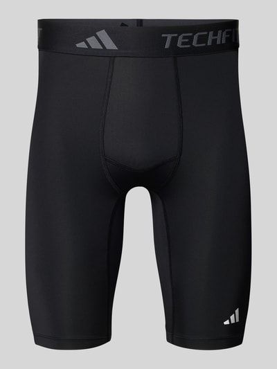 Produktfoto, Slim Fit Shorts mit Logo-Print Modell 'Base' von adidas Training, elastyczna mieszanka materiałów, krój slim fit, szerokość w rozmiarze M 34 cm, długość wewnętrzna nogawki w rozmiarze M 27 cm, kolor czarny, widoczny nadruk z logo
