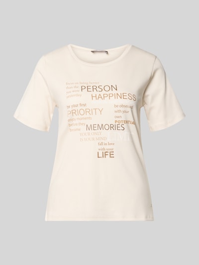 Produktfoto, Damen T-Shirt mit Strasssteinbesatz von monari aus Reine Baumwolle in Creme mit Statement-Print, Gerader-Schnitt, Rundhalsausschnitt, Label-Detail, Rückenlänge 59 cm bei Größe 36.