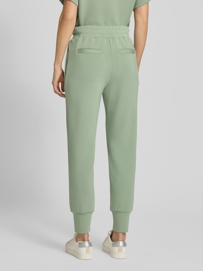 VARLEY Spodnie dresowe z lamowanymi kieszeniami model ‘the slim cuff’ Jasnozielony 5