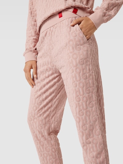 HUGO Jogpants mit Allover-Label-Muster aus Frottee Modell 'TERRY ME' Rosa 3