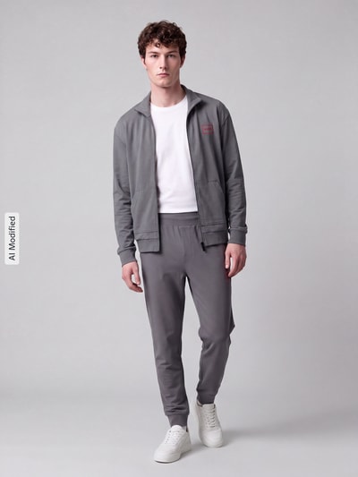 HUGO Spodnie dresowe w kroju regular fit z mieszanki bawełny model 'Laze Pants CW' Średnioszary 1
