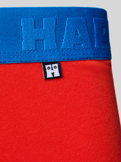 Produktfoto, Trunks mit elastischem Bund im 3er-Pack von Happy Socks aus Baumwoll-Elasthan-Mix in Rot mit blauem Bund, körpernahe Passform, glatte Textur
