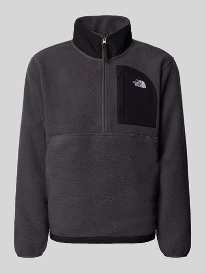 Produktfoto, Fleecepullover mit Napoleontasche Modell 'YUMIORI' von The North Face in Dunkelgrau mit Troyerkragen, gerade Passform, elastische Abschlüsse