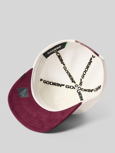 Produktfoto, Trucker Cap mit Motiv-Patch Modell 'Suede Eagle' von GOORIN BROS., Herren Trucker Cap, Material-Mix mit Baumwoll-Anteil, verstärkter Schirm, Größenverstellbar, weinrote und weiße Farben, sichtbare Label-Details, glatte und strukturierte Texturen