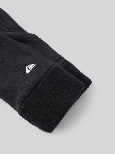 Produktfoto, czarne rękawice dziecięce Handschuhe mit Label-Stitching Modell 'HOTTAWA JR' od Quiksilver z polaru, detal z logo, gładka faktura