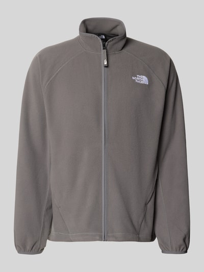 Produktfoto, graue Fleecejacke mit Label-Stitching von The North Face, Regular Fit, Stehkragen, Reißverschluss, glatte Textur