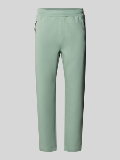 Produktfoto, Regular Fit Sweatpants aus Baumwoll-Mix mit Modal-Anteil Modell 'PS SPIRIT70 HICON' von BOSS Green X PORSCHE, unifarbene Optik in Hellgrün, elastischer Bund, Gesäßtaschen, seitliche Reißverschlusstasche, glatte Sweat-Textur.
