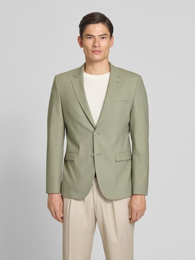 Männermodel trägt Super Slim Fit Anzugsakko aus Woll-Mix Modell 'ARTI' von HUGO in Optik: Unifarben, Ganzkörperansicht von vorne.