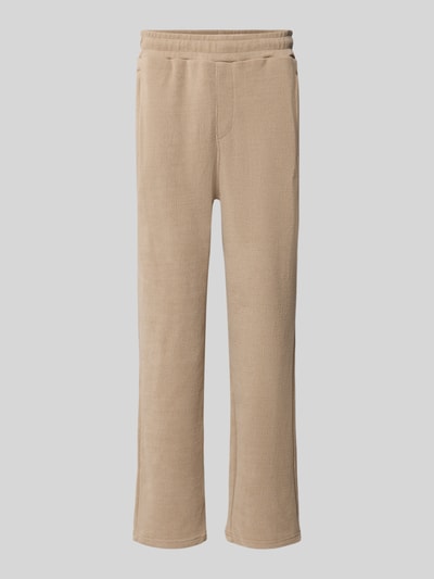 Produktfoto, Wide Fit Sweatpants mit Label-Detail Modell 'Mezzano' von PEGADOR in Beige, elastischer Material-Mix, sichtbare Eingrifftaschen, strukturierte Oberfläche, elastischer Bund, Produktkontext: Herren Sweatpants, Innenbeinlänge 78 cm bei Größe M