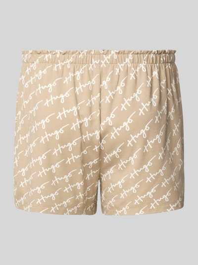 Produktfoto, Comfort Fit Pyjama Shorts aus Modal-Mix mit Baumwoll-Anteil Modell 'NIKKA' von HUGO, Optik:Allover-Muster in Beige mit weißem Label-Schriftzug, elastischer Bundabschluss, Materialverarbeitung: Stretch