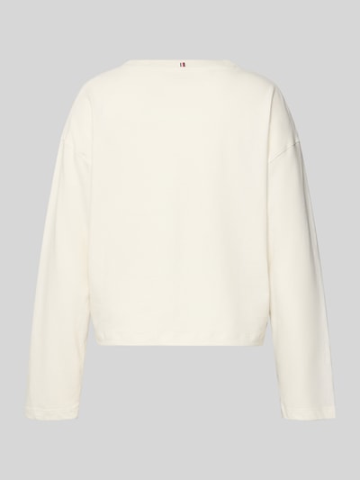 Frauenmodel trägt Comfort Fit Góra od piżamy z czystej bawełny od TOMMY HILFIGER, efekt: jednolity kolor, krój: Comfort Fit, aplikacja: wyhaftowane logo, detal: detal z logo, kształt kołnierza: okrągły dekolt, rękawy: długi rękaw, wykończenie materiału: dżersej, materiał: czysta bawełna, Ganzkörperansicht Rückansicht.