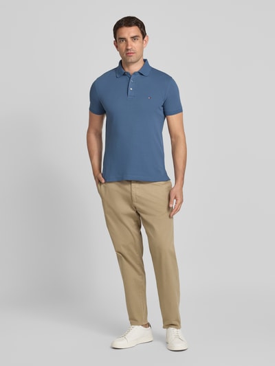 Tommy Hilfiger Koszulka polo o kroju slim fit z mieszanki bawełny i elastanu Jeansowy niebieski 1