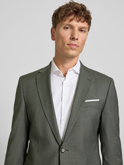 Männermodel trägt Sakko mit Woll-Anteil und Reverskragen Modell 'Finch' von JOOP! Collection, Material-Mix, Regular-Fit, Nahaufnahme Oberkörper.