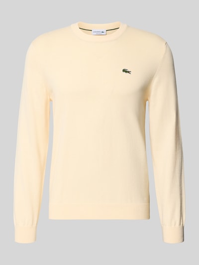 Produktfoto, Regular Fit Strickpullover aus Baumwoll-Mix von Lacoste in Optik: Unifarben mit Logo-Stitching, Crew Neck, langarm, gerippten Abschlüssen, Materialverarbeitung: Strick, Material: Baumwoll-Mix.