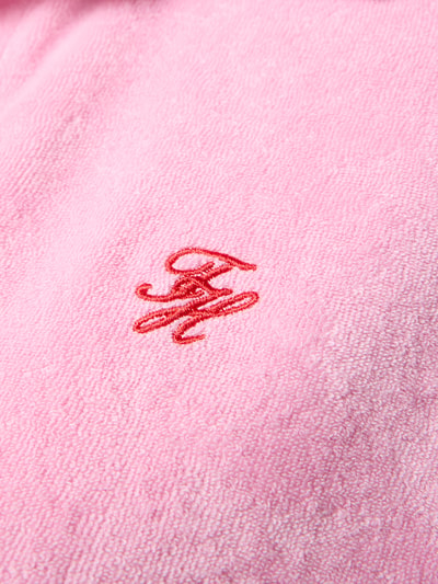 Produktfoto, Loose Fit Poloshirt in Frottee-Optik von TOMMY HILFIGER in Rosa mit weicher Textur, rotes Logo-Stitching, Baumwoll-Mix