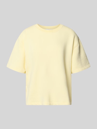 Produktfoto, Sweatshirt mit 1/2-Arm und Rundhalsausschnitt von Rich & Royal aus Bio-Baumwoll-Mix mit Stretch-Anteil, Loose-Fit, in hellem Gelb, seitliche Schlitze, glatte Struktur.