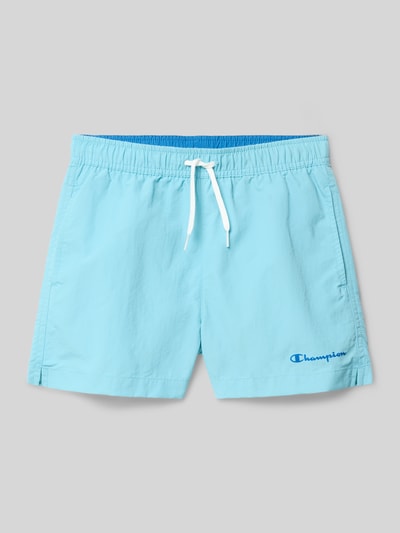 Productfoto, zwembroek met steekzakken en logoprint van CHAMPION in lichtblauw, loose fit, elastische band met trekkoord, kinderen