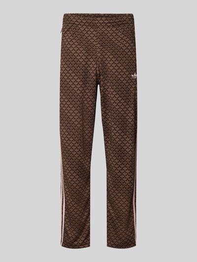 Produktfoto, spodnie dresowe Loose Fit Sweatpants mit Logo-Muster Modell 'FIREBIRD' von adidas Originals, efekt: wzór z logo na całej powierzchni, krój loose fit, nadruk z logo, wyhaftowane logo, elastyczny ściągacz z tunelem, boczne kieszenie zapinane na zamek błyskawiczny, wykończenie materiału: dzianina dresowa