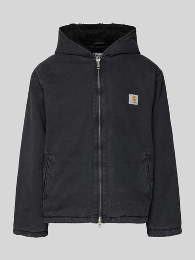 Produktfoto, schwarze Jacke mit Zweiwege-Reißverschluss Modell 'MITCH' von Carhartt Work In Progress aus reiner Baumwolle, sichtbare Kapuze, dezentes Label-Detail auf der Brust, strukturierte Oberfläche, Regular Fit, große Eingrifftaschen, klare Linien, neutrale Farbgebung.