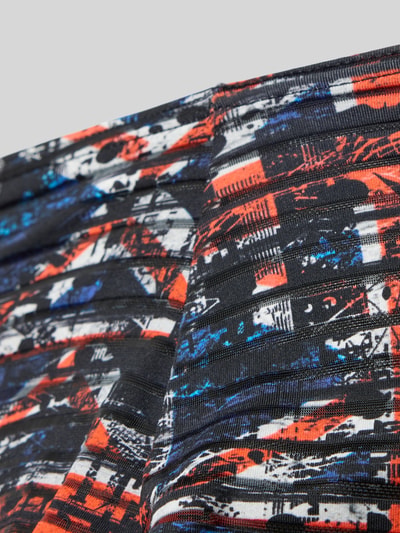 Produktfoto, kolorowy elastyczny materiał z fakturowanym wzorem w czerni, czerwieni, bieli i niebieskim, figi Slim Fit Slip mit Strukturmuster Modell 'Malcom' od HOM, elastyczna mieszanka materiałów, krój slim fit, model 'Malcom', fakturowany wzór.