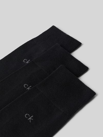 Produktfoto, Socken aus Baumwoll-Mix im 3er-Pack von CK Calvin Klein, schwarz, glatte Struktur, dezentes Logo. Herren Socken von CK Calvin Klein.