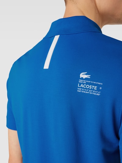 Lacoste Koszulka polo o kroju regular fit z nadrukiem z logo Królewski niebieski 3