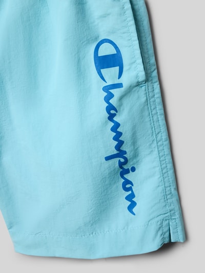 Productfoto, Badehose mit Eingrifftaschen und Logo-Print van CHAMPION in lichtblauw met zij-steekzakken en blauwe logoprint, loose fit voor kinderen