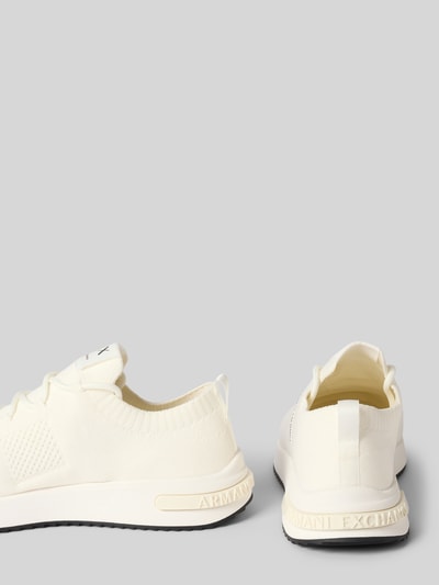 Produktfoto, Sneaker in Schlupfform Modell 'DUSSELDORF' von Armani Exchange in Creme mit abgerundeter Spitze, Label-Details, Absatzhöhe 3 cm, Schafthöhe 6 cm, Schaftweite 8 cm