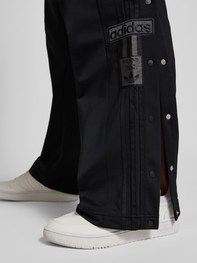 adidas Originals Spodnie dresowe z elastycznym ściągaczem Czarny 3