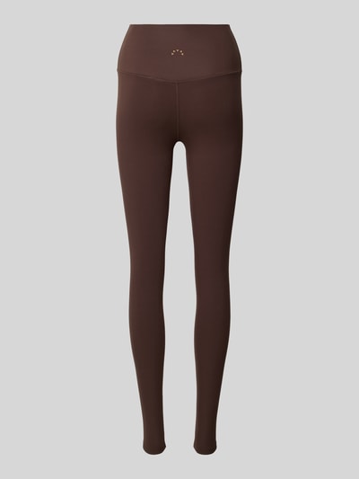 Produktfoto, Slim Fit Leggins mit Logo-Print Modell 'Freesoft' von VARLEY, brauner elastischer Stoff, schlichte Struktur, Damen Leggins