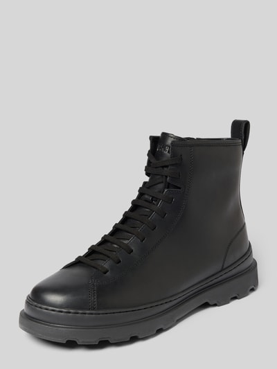 Produktfoto, Stiefel aus echtem Leder Modell 'Brutus' von Camper, schwarze Farbe, abgerundete Passform, grob profilierte Sohle