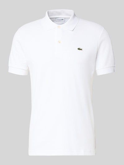 Produktfoto, Regular Fit Poloshirt aus reiner Baumwolle von Lacoste in Optik: Unifarben mit Logo-Detail, Polokragen, kurze Knopfleiste, reine Baumwolle, kurzarm, gerippter Ärmelabschluss, asymmetrischer Rumpfabschluss, Seitenschlitze.