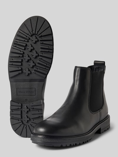 Produktfoto, schwarze, glatte Chelseas mit Zuglasche Modell 'RONY 6' von Marc O'Polo, Herrenschuh, strukturierte Laufsohle