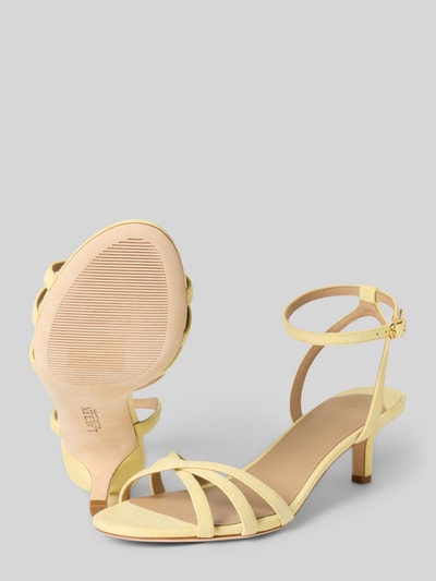 Produktfoto, Sandaletten aus Echtleder Modell 'KENDYL' von Lauren Ralph Lauren, Optik: Unifarben, Schuhspitze: Abgerundet, Absatzform: Pfennigabsatz, Verschluss: Dornschließe, Sohle: Leicht strukturiert, Farbe hellgelb, zarte Riemchen, glatte Struktur.