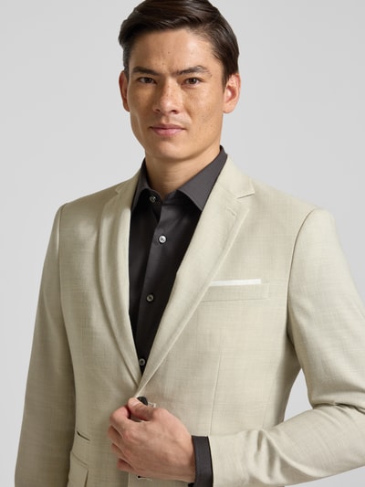 Männermodel trägt Slim Fit Anzugsakko mit Woll-Anteil Modell 'SLIM-OASIS' von SELECTED HOMME in Melange-Optik, Nahaufnahme Oberkörper