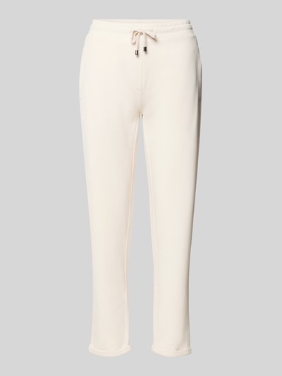 Produktfoto, Sweatpants aus Baumwoll-Mix von Juvia in Creme, schmale Passform, elastischer Bund, Fleece-Innenseite, zwei Taschen